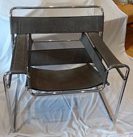 Front view of B3 Wassily style chair showing chrome frame and vinyl webbing