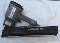 Left side view of Paslode 5300/75S Plus framing nailer showing full body and magazine