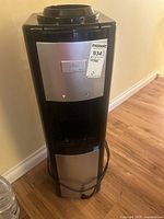 Front view of black and silver Vitapur VWD2668LP water cooler showing dispensing area and brand label.