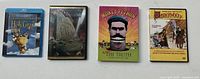 Front view of four Monty Python DVD cases lined up showing cover art