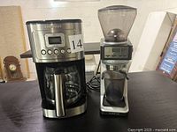 Front view of coffee maker and grinder side by side