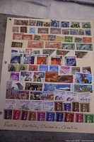Overview image of two stock sheets with stamps from Russia, Serbia, Slovenia, and Croatia, showing a variety of colors and themes.