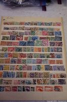 Full view of one stock sheet showing multiple rows of old Austrian stamps with diverse colors and postmarks