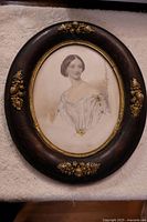 Full front image of the old oval framed portrait showing Lady Gertrude Fitz Patrick in early 1800's style dress.