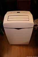 Front view of white portable air conditioner