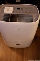 Front view showing control panel and vents