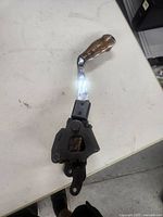 Full view of shifter assembly with handle, lever and base