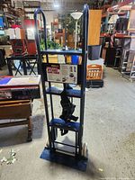 Full view of blue appliance hand truck