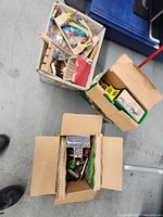 Three boxes of assorted Brio wooden railway components