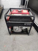 Front view of Honda generator in frame showing engine block