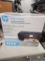 Front of sealed HP Envy 4520 printer box