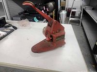 Side view of red Best Universal Lock Co. Key Combinator