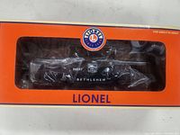 Front view of boxed Lionel Bethlehem Steel transfer caboose through window