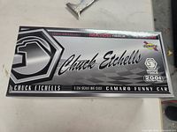 Box top showing branding and model details