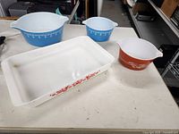 Group shot of all four Pyrex pieces on table