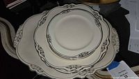 Stacked view of 15 x 11 inch serving platter with 10 inch and 7 inch plates in Virginia Rose pattern