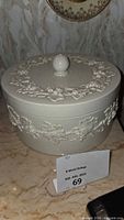 Round Wedgwood Embossed Queens Ware covered dish with lid and floral embossed pattern