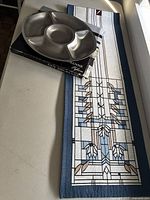 Serving dish and decorative runner side by side, showing overall appearance and scale