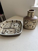 Small rectangular pottery vase with similar brown and cream abstract patterns