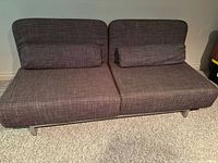 Two-seat sofa configuration with cushions in front view