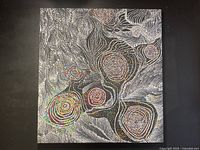 Full view of the unsigned abstract oil on canvas showing the concentric circular patterns and dot work typical of Australian Indigenous art.