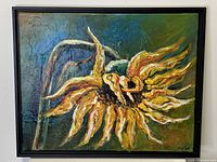 Framed oil painting of a sunflower by Margaret Alpen, measuring 16 x 20 inches.