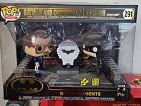 Front view of the boxed Funko Pop Heroes Batman and Commissioner Gordon set showing the figures and the Bat-Signal.