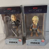 Both front boxed view of Geralt of Rivia and Ciri Minix collectible figures from Netflix The Witcher series.