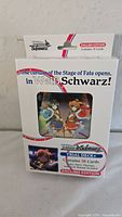 Front view of the Weiss Schwarz Trial Deck box showing anime characters and key branding details including English edition and 20 cards