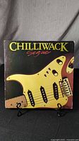 Front cover of 'Segue' vinyl LP album by Chilliwack, showing electric guitar artwork and album title.