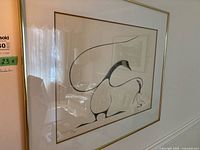 Full front view of framed print on wall