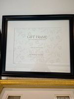 Large black picture frame with mat for 10x13 or 14x17 photos, black molding, glass front