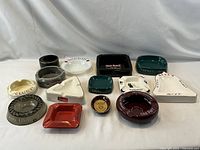 Top view of all 14 ashtrays arranged in three rows