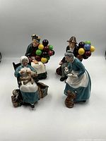 All four figurines grouped