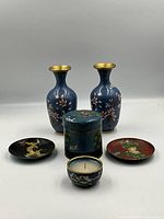Entire lot: two vases, two trays, tea caddy, candle bowl