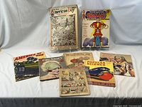 Group shot of all eight publications