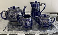 full tea set on tray, front angled view