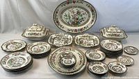 Full lot overview of 48-piece Indian Tree porcelain set