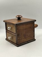 three-quarter view of wooden voting box