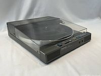 Three-quarter view of turntable with closed dust cover