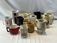 All 12 advertising pitchers front view