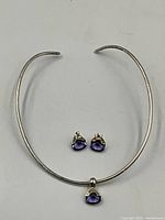 Full view of sterling collar necklace with pendant and matching earrings