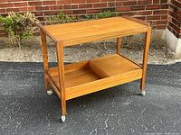 Full view of teak bar cart front and side
