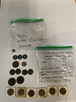 Group view showing all coins, ration discs and flips