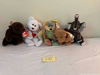 Front view of all five Ty Beanie Babies lined up with tags visible