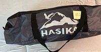 Branded Hasika carry bag holding awning