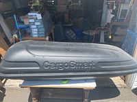 Top view showing CargoSmart logo and textured black finish