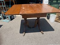 Full view of wooden folding dining table outdoors