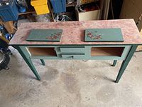 Full view of console table with detached doors placed on top