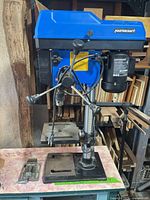 Full view of Mastercraft drill press on bench